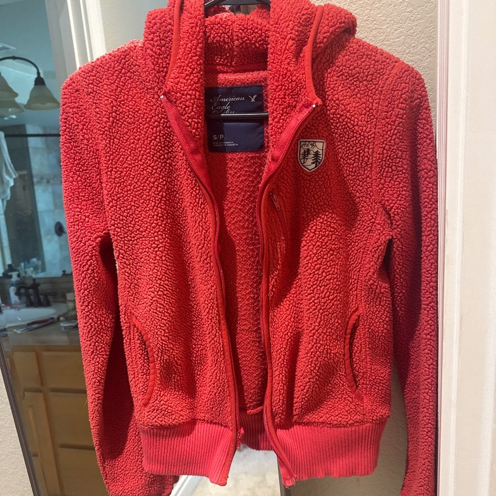 A&E red sherpa zip up